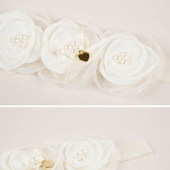 Kenjudess flower lace detail on headband emphasizes delicate craft.