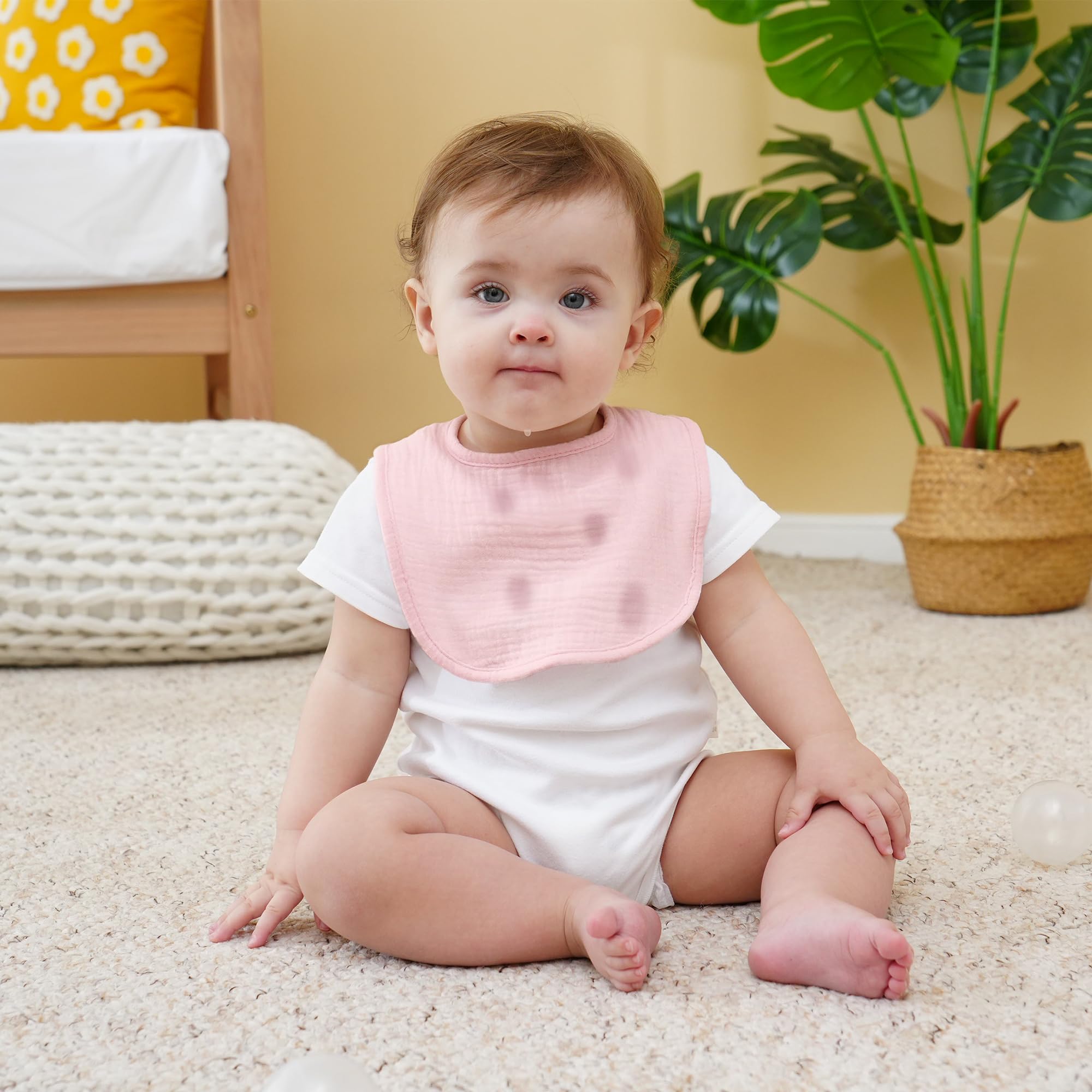 Kewlife gift muslin baby bibs pink on a baby during daily wear