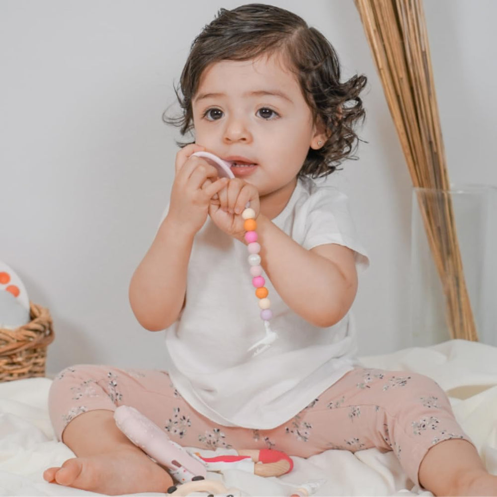 Night-time soothing KH Kids Heroes pacifier by crib for bedtime.