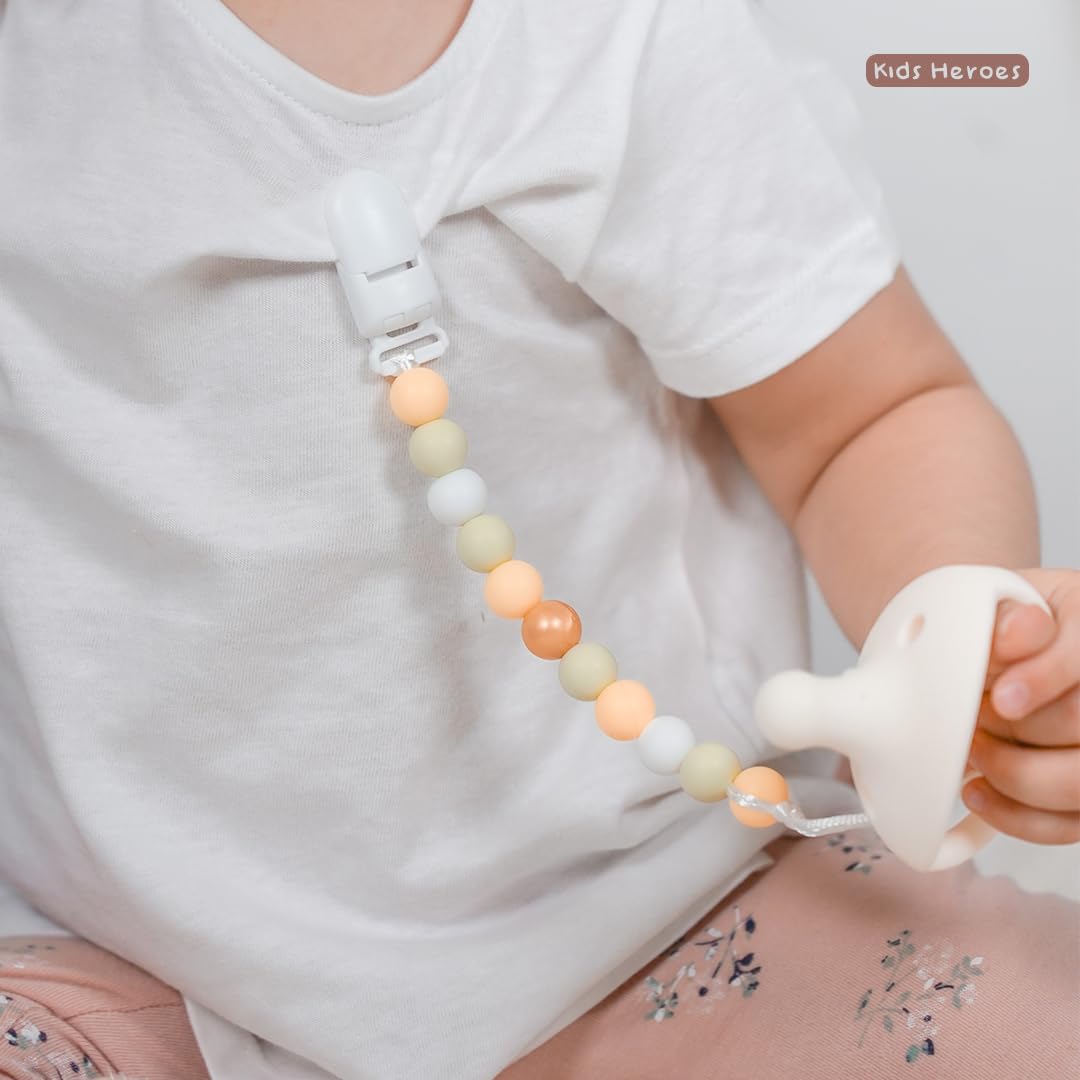 Gift-ready KH Kids Heroes pacifier packaging for baby showers.