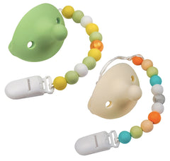 Ergonomic curved handle on KH Kids Heroes pacifier for tiny hands.