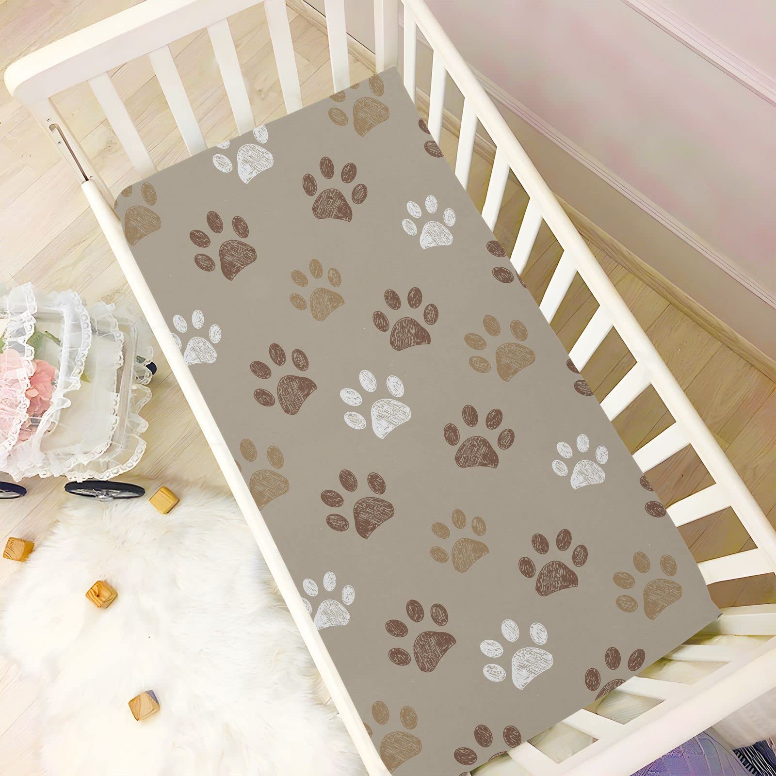 KICPOAY 52x28 inch size fits most mini cribs and playards.