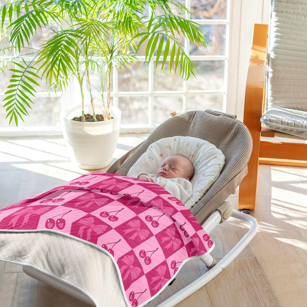 KICPOAY baby in swaddle, nursery scene highlighting versatility