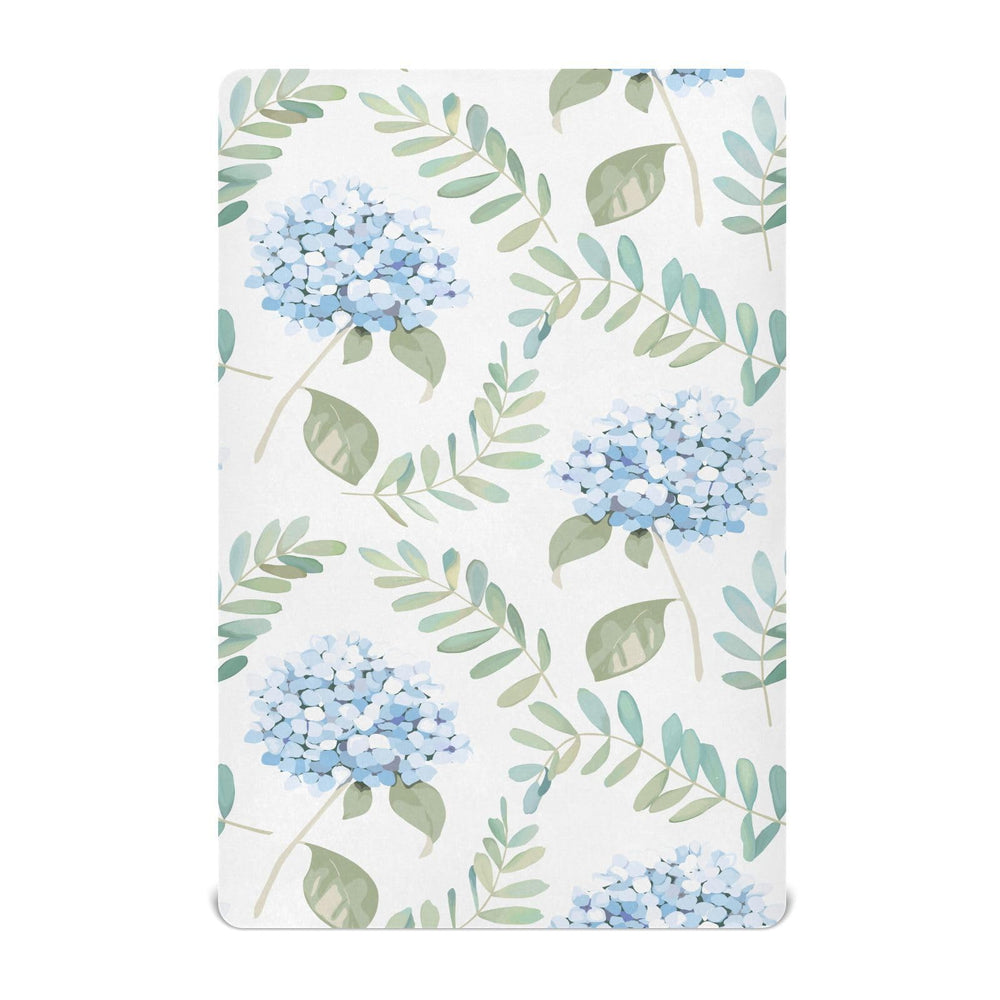 KICPOAY blue floral hydrangeas crib sheet showing cozy, secure sleep surface.