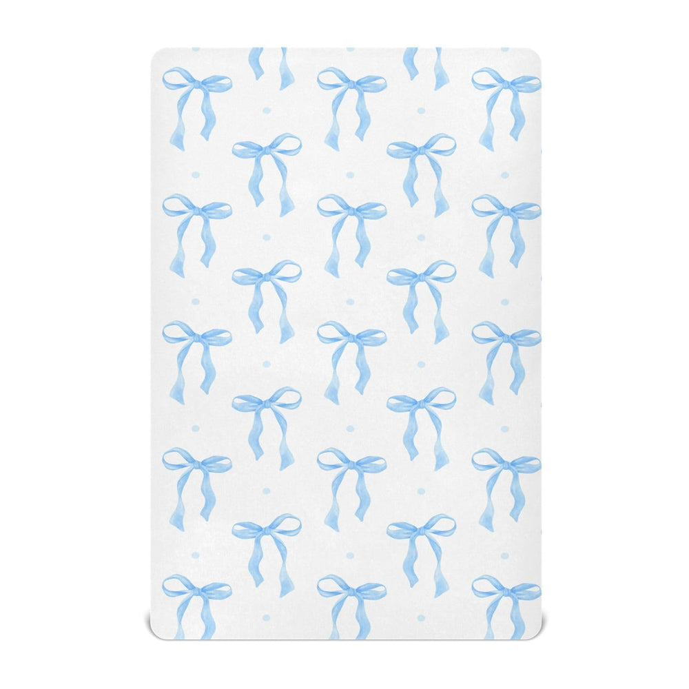 KICPOAY Coquette Blue Bow Watercolor playard sheet close-up, showcasing soft stretch fabric for comfort.