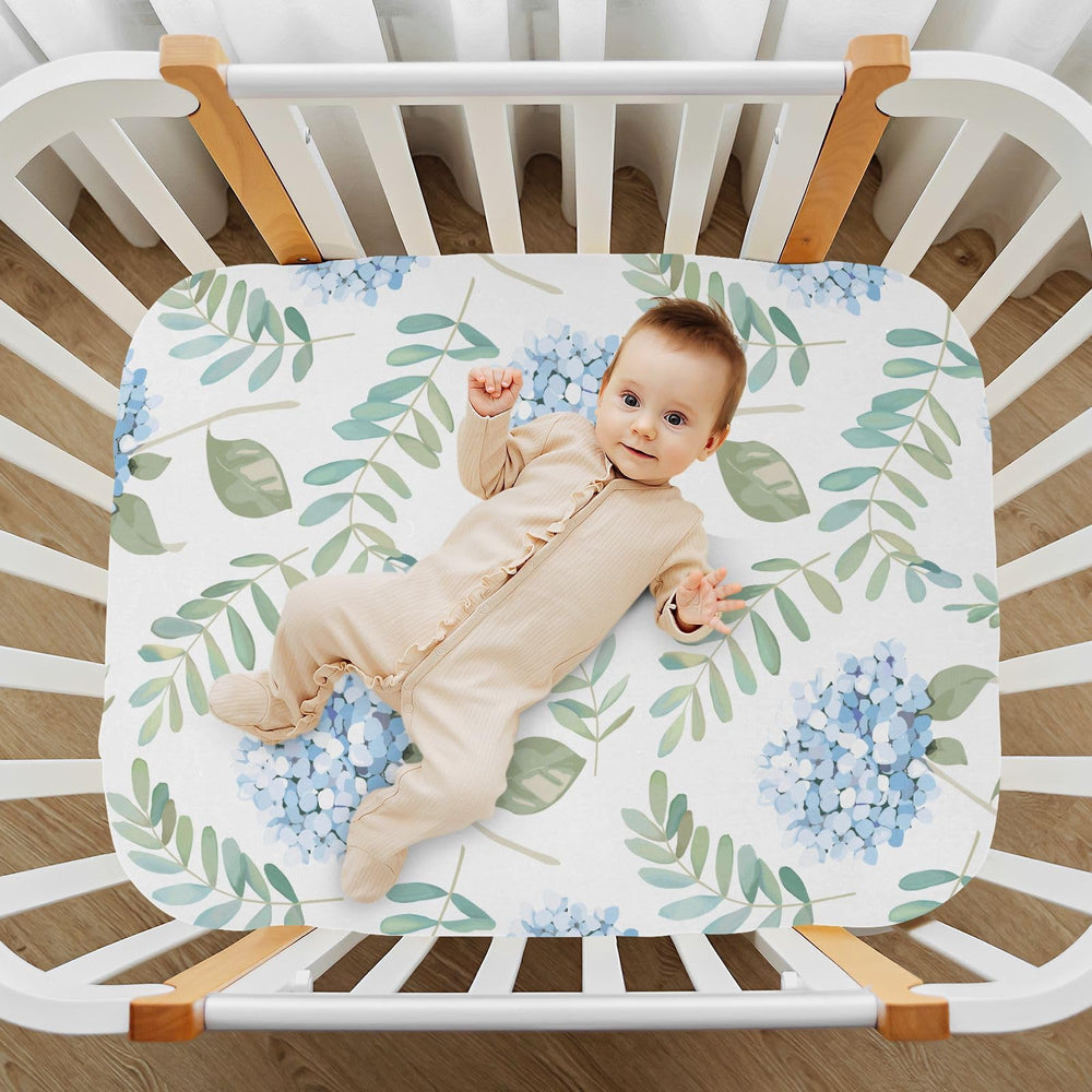 KICPOAY playard sheet 39x27 features secure elastic fit for safe, stable placement