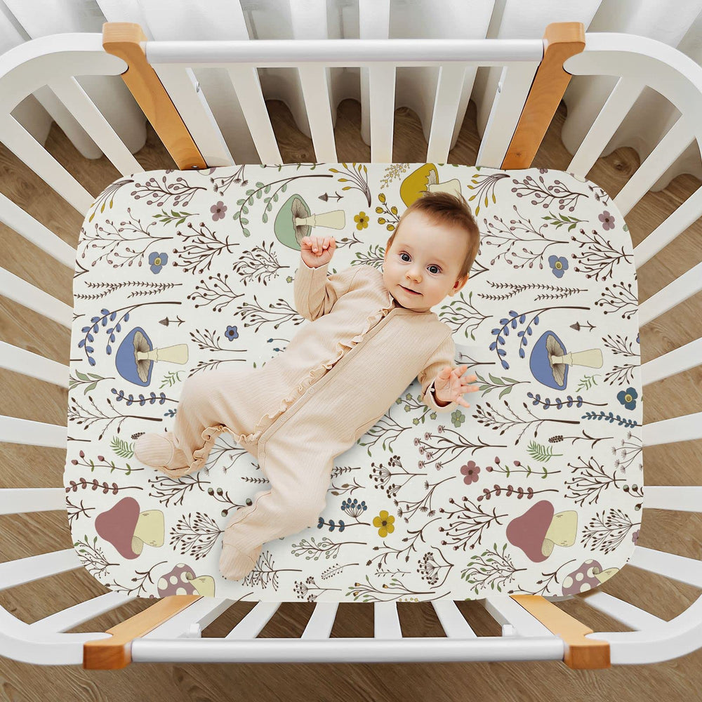 KICPOAY playard sheet with elastic band ensures snug fit.
