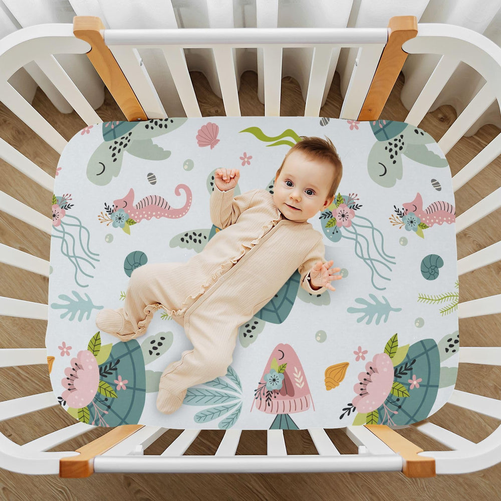 KICPOAY sea horse pattern playard sheet for durable, stretchable fit.