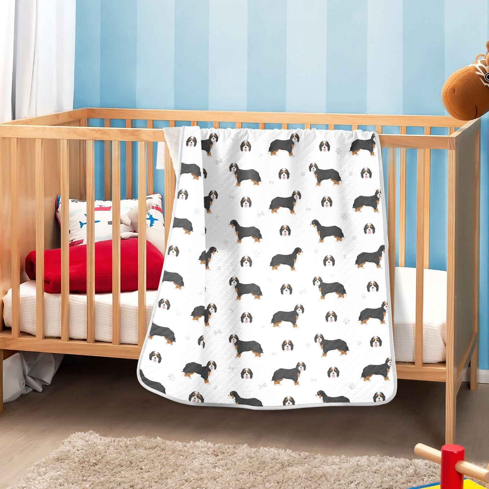KICPOAY Swaddle Blanket laid flat as a burp cloth alternative.