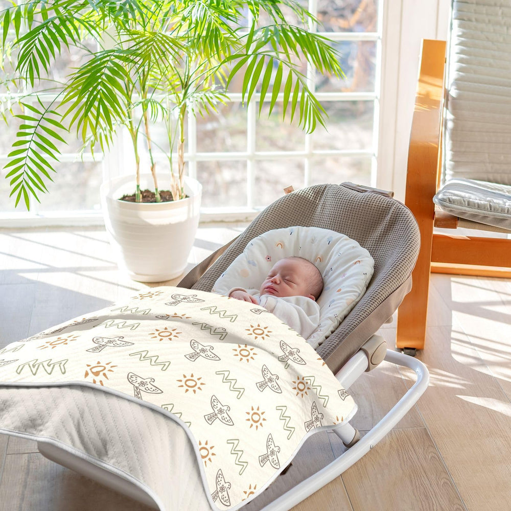 KICPOAY swaddle in nursery ambiance used as cover or mat