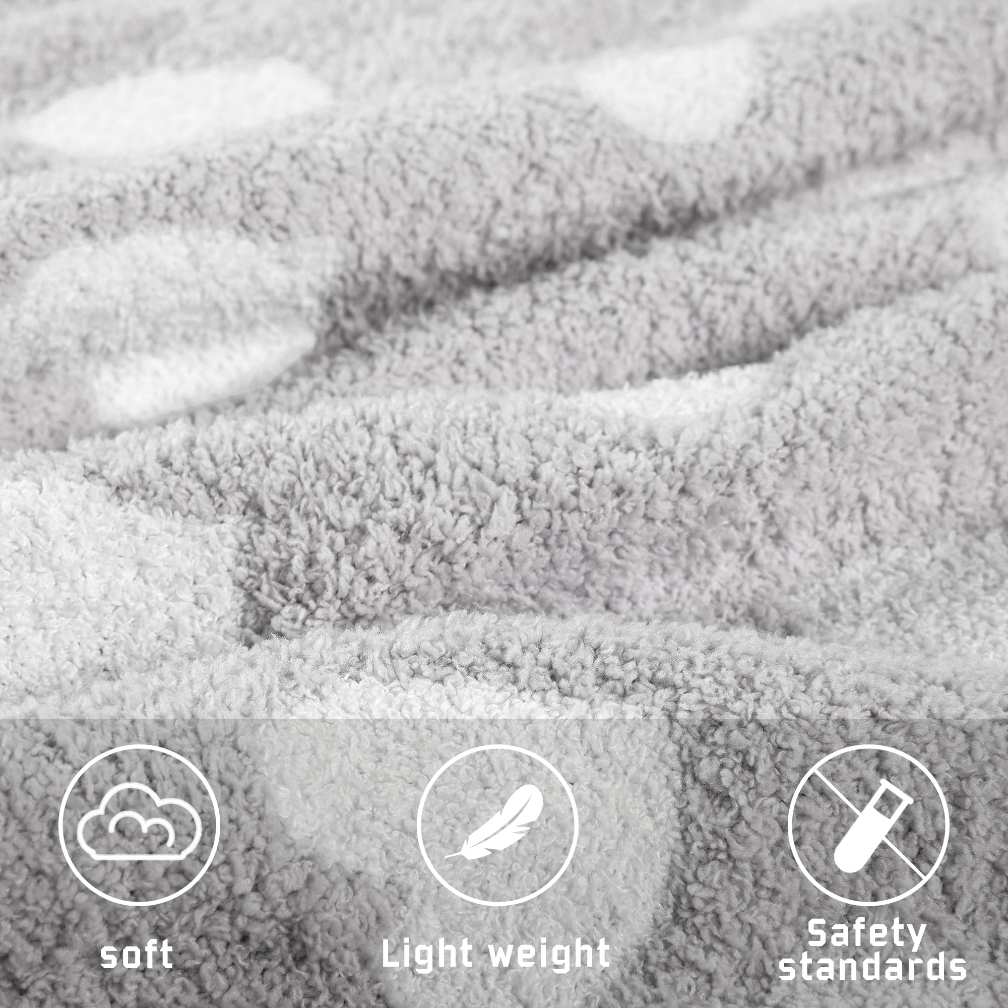 Close-up of Kid Nation soft plush blanket texture for cuddly comfort.