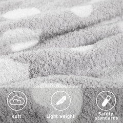Close-up of Kid Nation soft plush blanket texture for cuddly comfort.