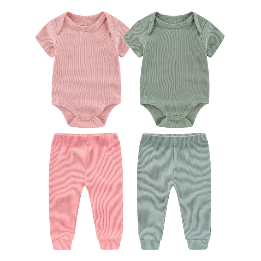 Kiddiezoom newborn layette set with bodysuits and pants laid out for easy outfit planning