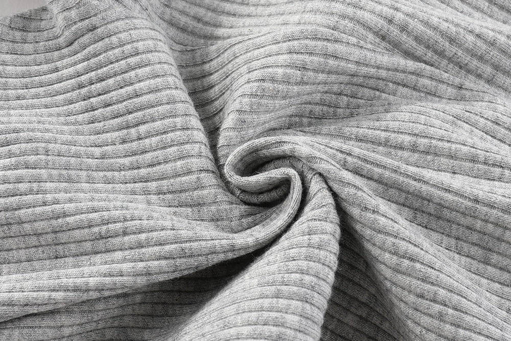 Kiddiezoom newborn layette set cotton fabric closeup shows soft texture