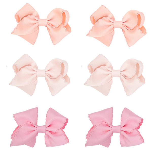 KIDOCHEESE baby hair bows clip set in three colors for secure all-day wear.