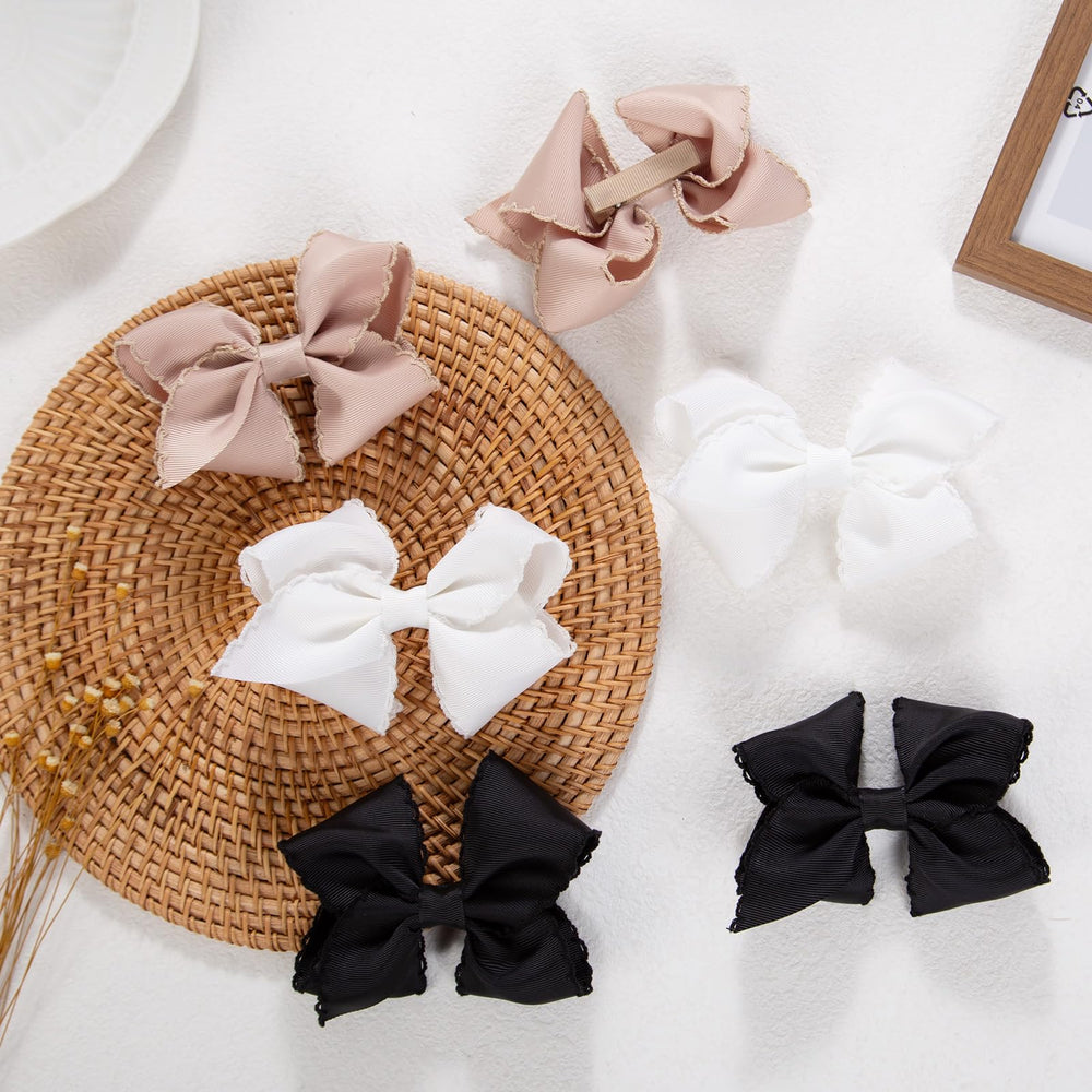 KIDOCHEESE multicolor grosgrain clips brighten outfits while staying secure.