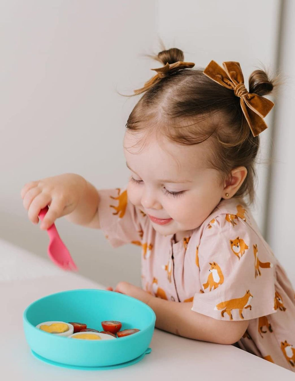 KIDOCHEESE baby hair bows on a child demonstrate comfortable, secure styling.