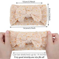 KIDOCHEESE nylon elastic headband on a newborn demonstrates comfortable fit.