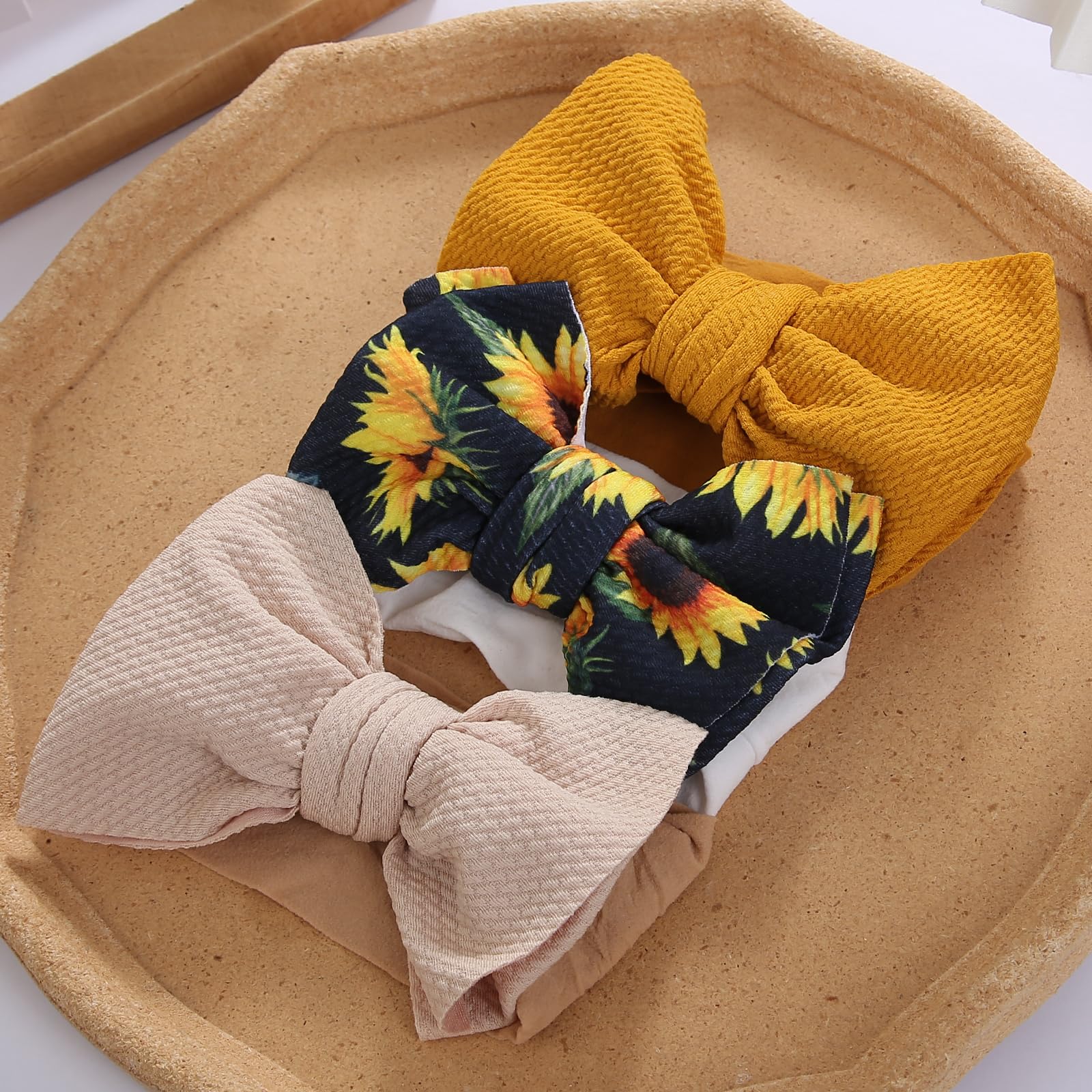 KIDOCHEESE Big Bows cream headband with soft fabric for sensitive skin.