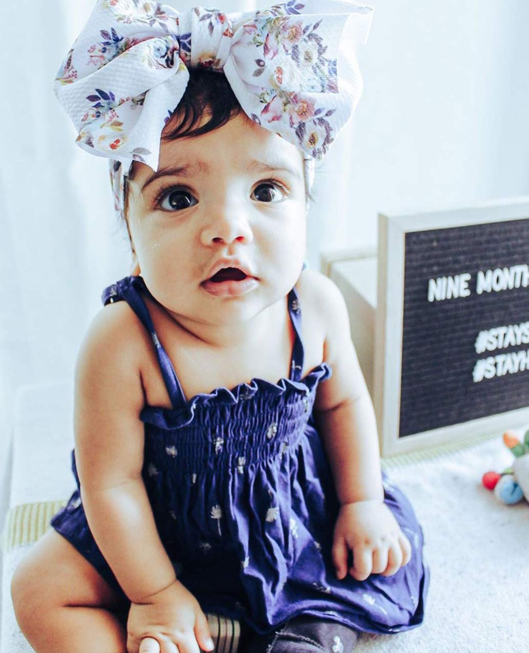 KIDOCHEESE oversized bow headband, perfect for birthday shoots and photography.