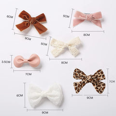 KIDOCHEESE colorful bows collection offers colors for coordinated looks.