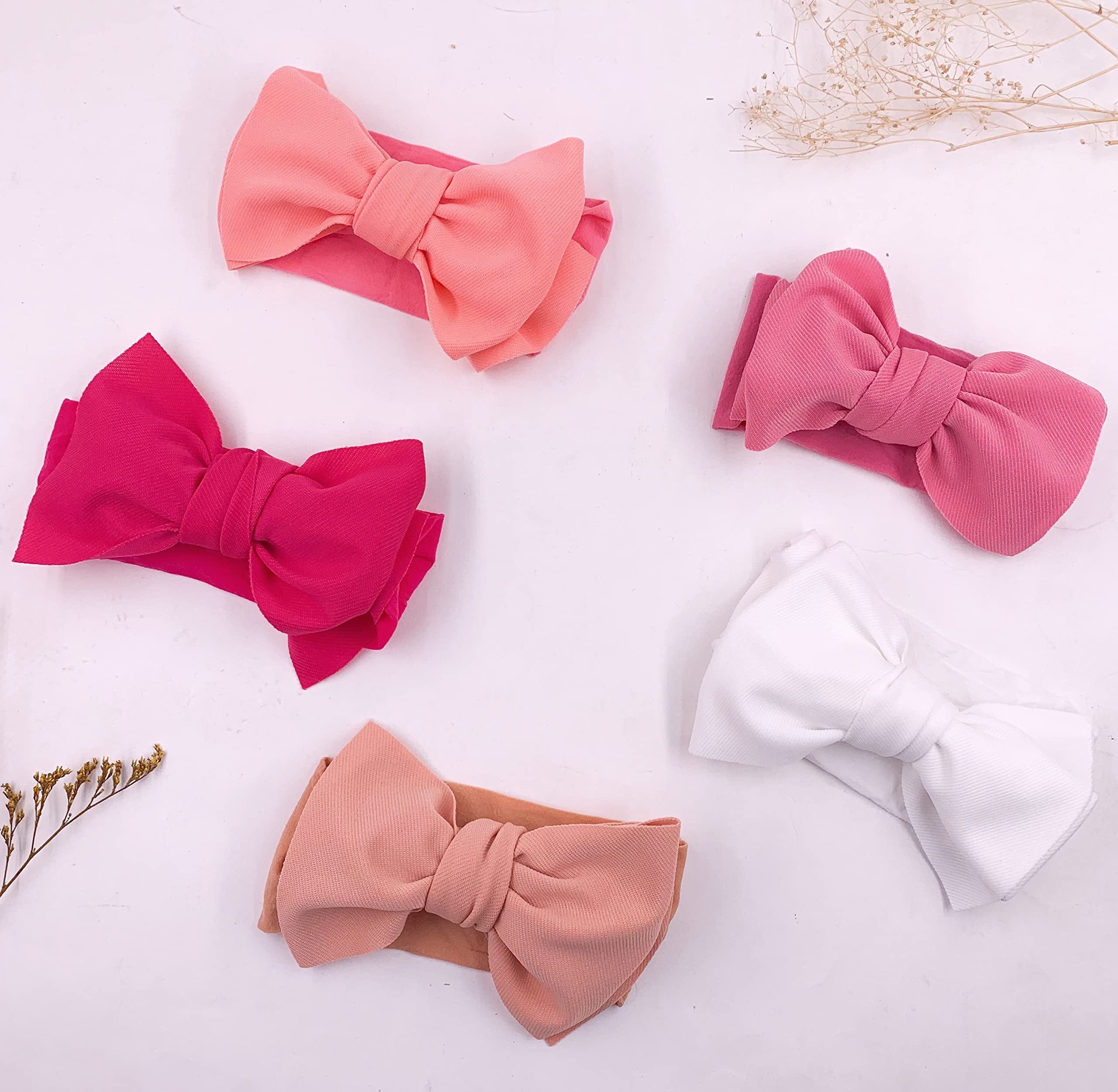 KIDOCHEESE delicate fabric headband offers gentle comfort.