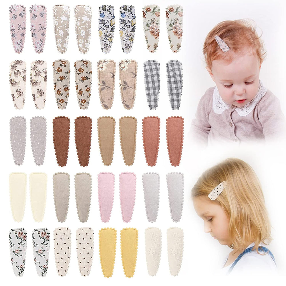 KIDOCHEESE flower-pattern snap hair clip wrapped in cloth for secure, stylish baby hair