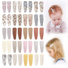 KIDOCHEESE flower-pattern snap hair clip wrapped in cloth for secure, stylish baby hair