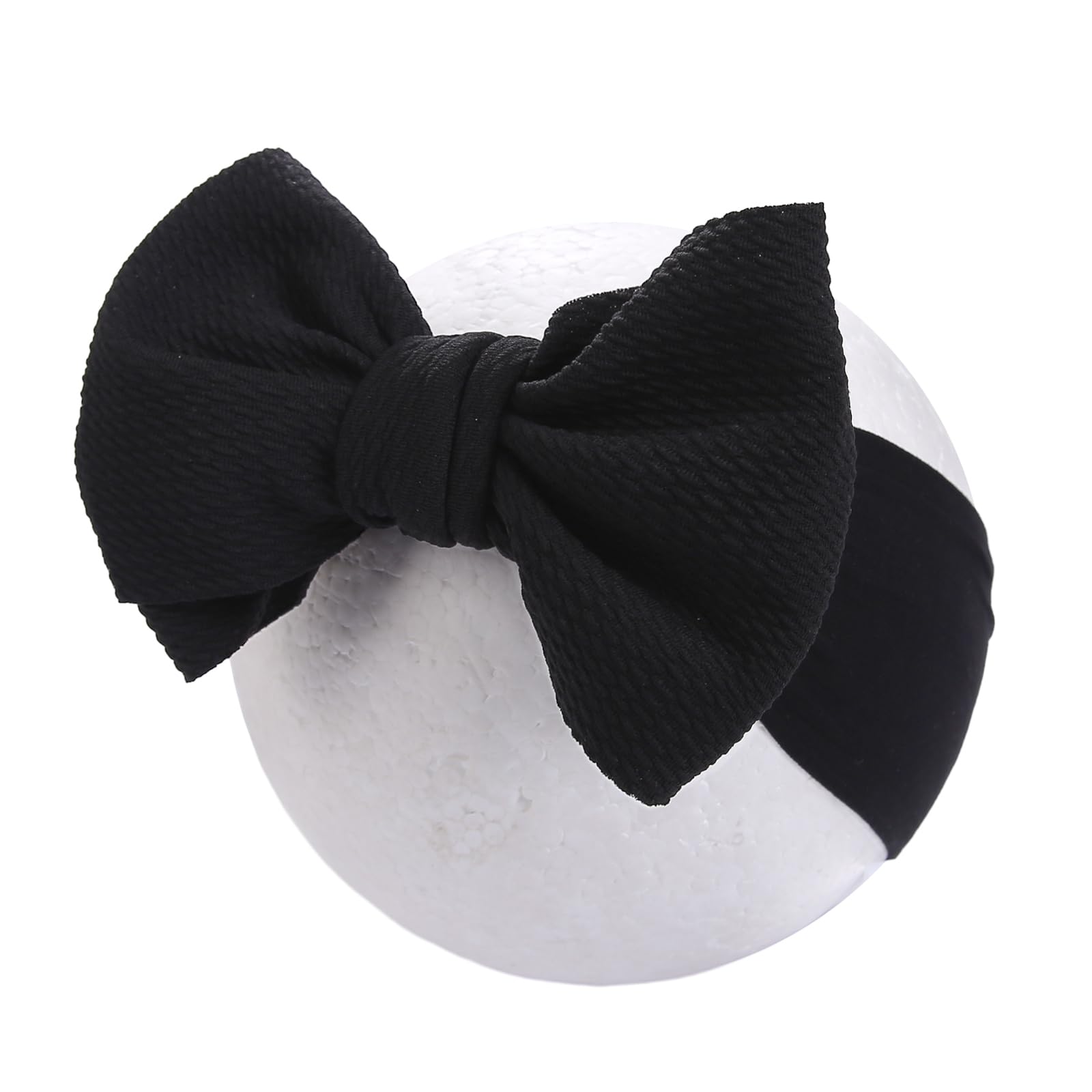 KIDOCHEESE Oversized bows suit birthdays, photos, and everyday wear.