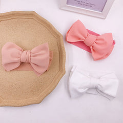 KIDOCHEESE multi-color bows headband for coordinating outfits.