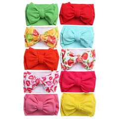 KIDOCHEESE oversized bow headband pack showing 10 colors, ideal for coordinating outfits.