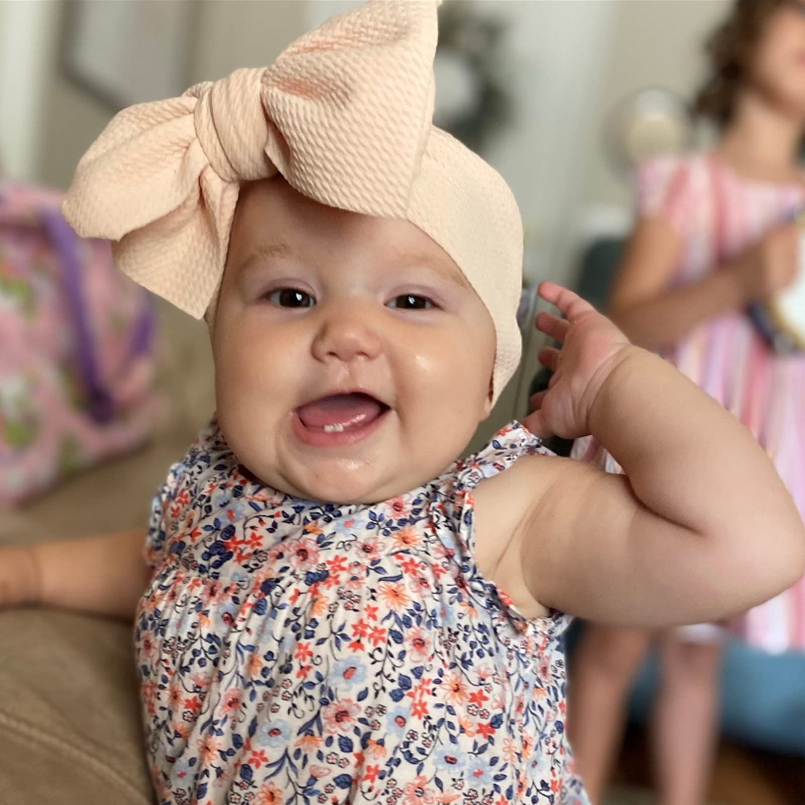 KIDOCHEESE photoshoot-ready headband enhances baby portraits.