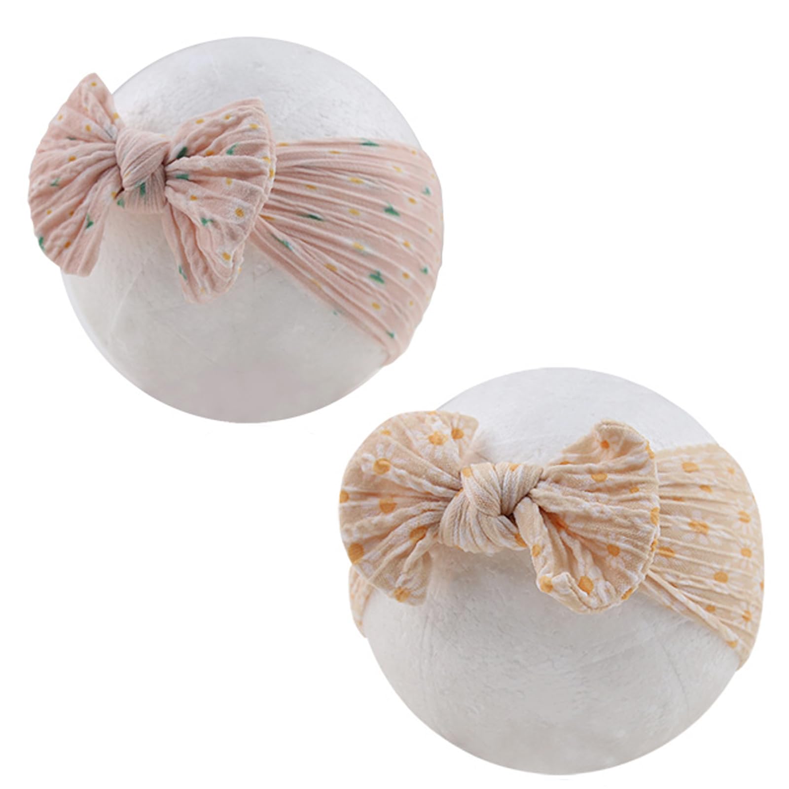 KIDOCHEESE printed headbands add charm to baby's outfits.