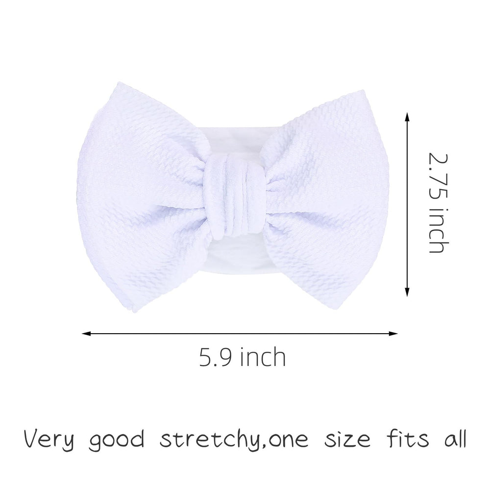 KIDOCHEESE Soft fabric bows stay in place without slipping or leaving marks.
