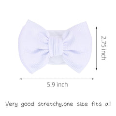 KIDOCHEESE Soft fabric bows stay in place without slipping or leaving marks.