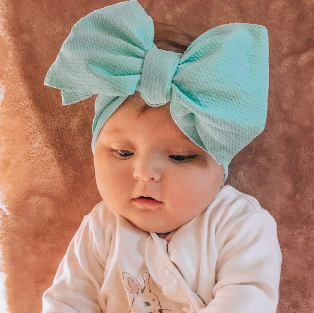 KIDOCHEESE soft fabric headband elastic fit, gentle on delicate baby skin.