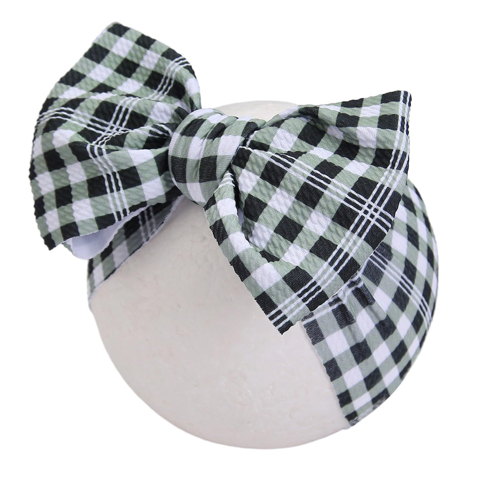 KIDOCHEESE versatile bow headband makes a thoughtful baby gift.