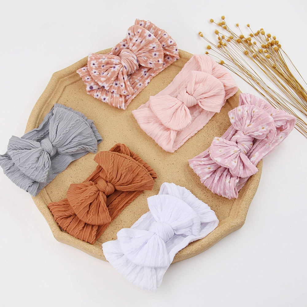 Kidocheese white headband with bow complements outfits beautifully.