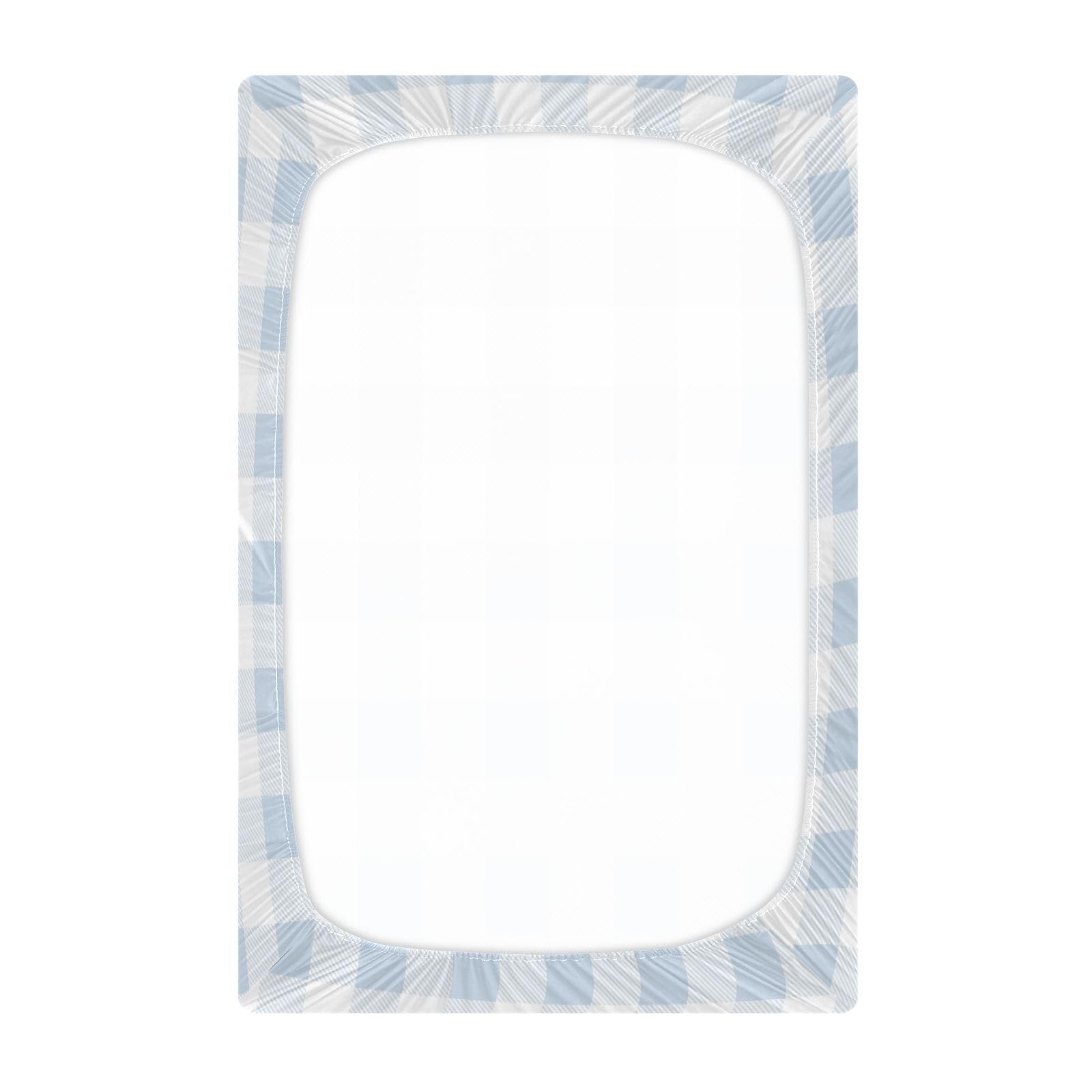 Kigai blue gingham crib sheet on toddler bed demonstrating universal fit.
