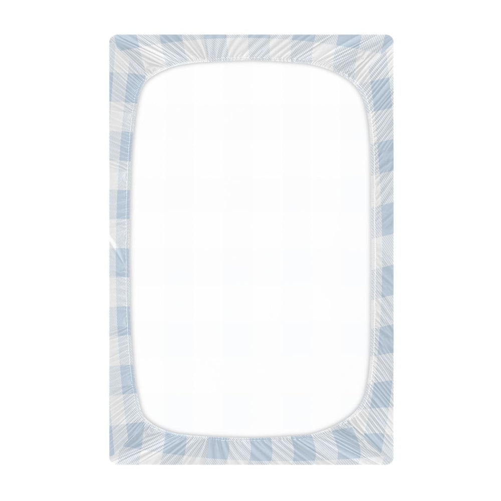 Kigai blue gingham crib sheet on toddler bed demonstrating universal fit.