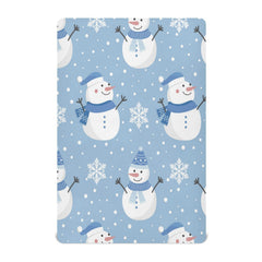 Kigai Christmas snowman crib sheet with snowflakes creates a cozy nursery ambiance.