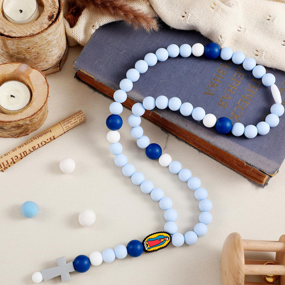 Kigeli blue cross baptism silicone rosary for baby's baptism ceremony.