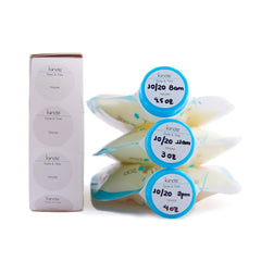 Kiinde breast milk storage bags neatly stored on their sides for compact organization.