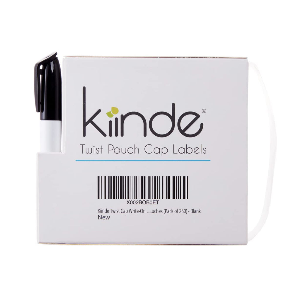 Kiinde Twist cap write-on labels with dispenser for easy breast milk labeling.