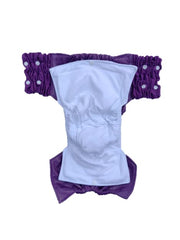Kijani Baby night time diapers with stretchy sides and side snaps for easy on/off.