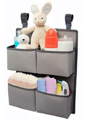 KIKJOK hanging diaper organizer for crib with four deep pockets keeps essentials within easy reach.