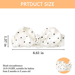 Kilener polka-dot headband with bow adds charming detail.
