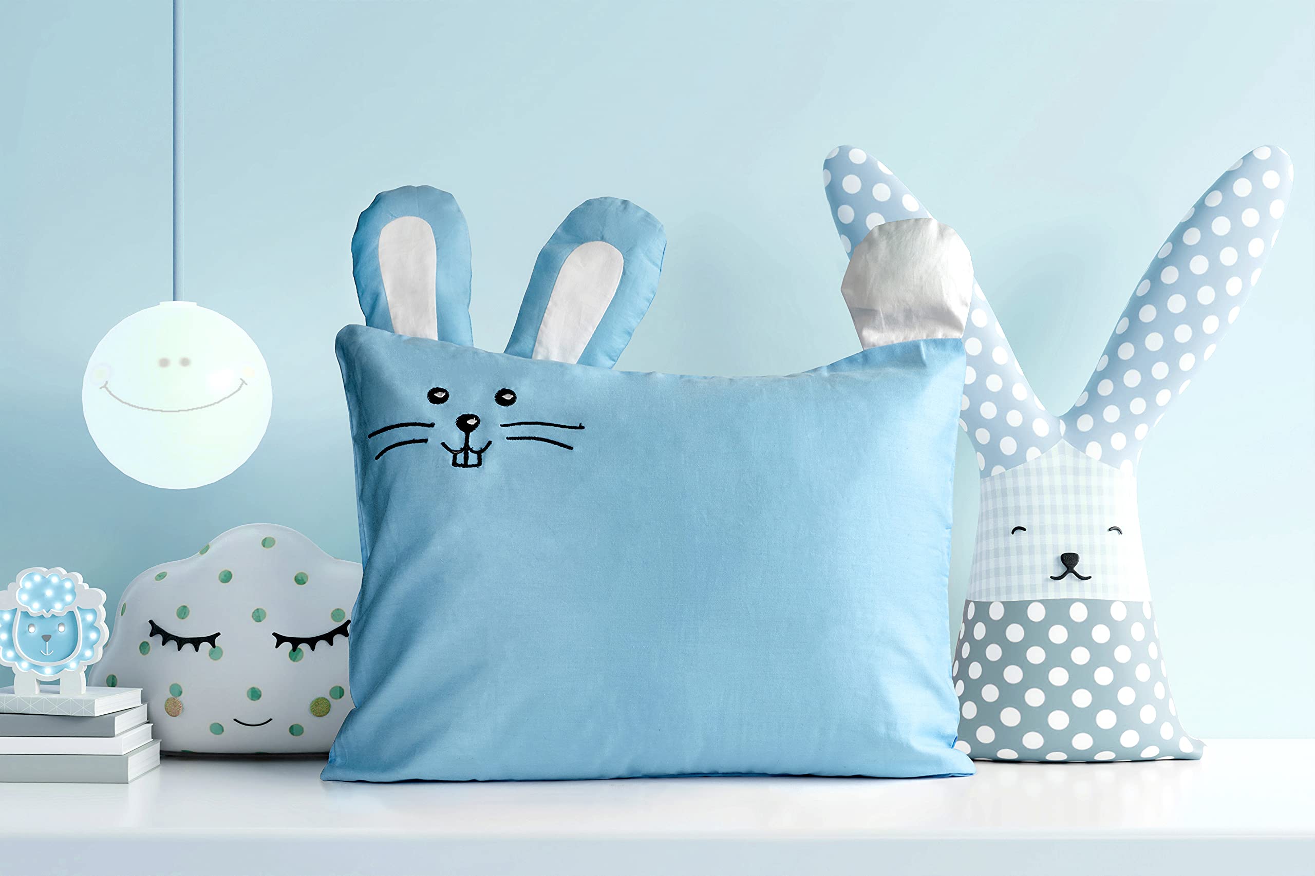 Pillow in use during nap time on a cozy toddler bed setup.