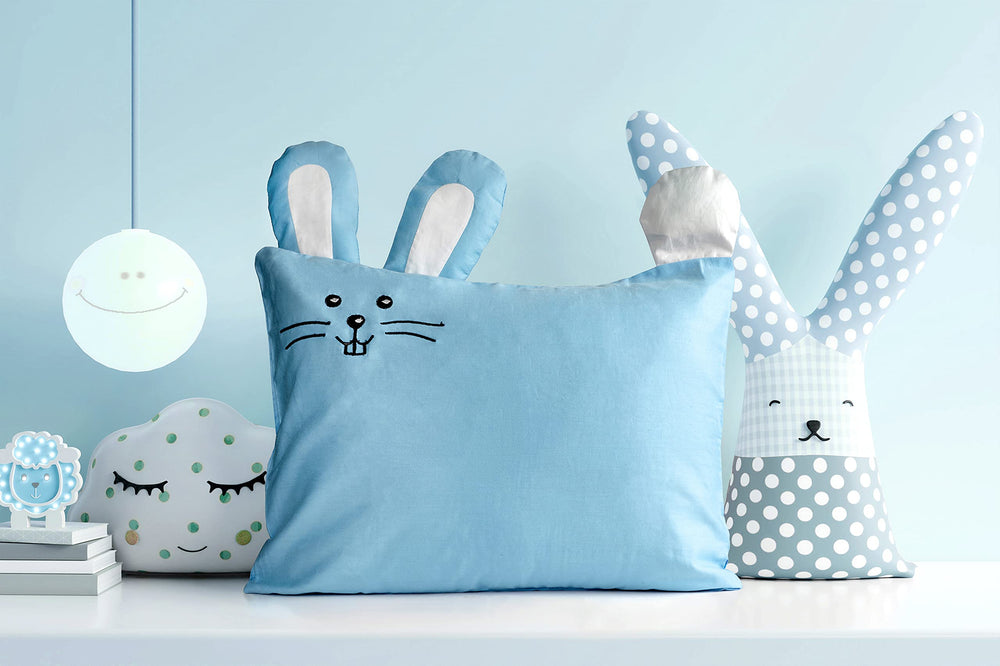 Pillow in use during nap time on a cozy toddler bed setup.