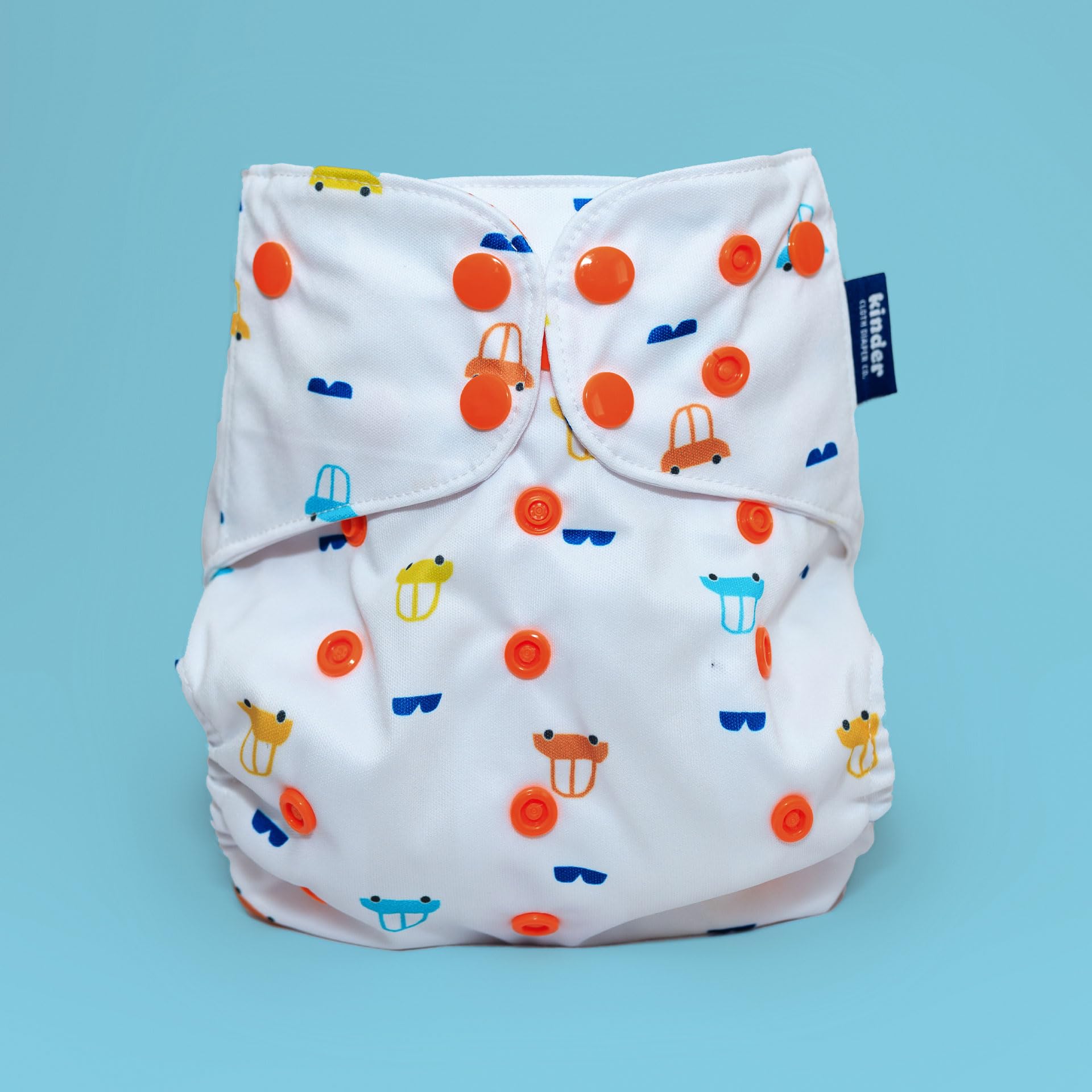 Kinder waterproof tummy panel close-up demonstrating leak protection for tummy sleepers.